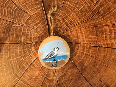 Painted driftwood ornament